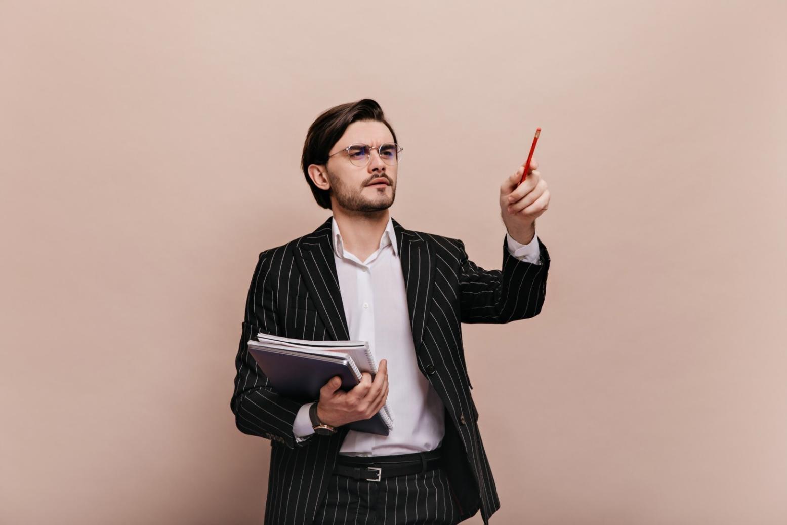 Business acquisition planning session with financial documents